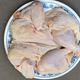Aerial view of raw spatchcocked chicken on plate